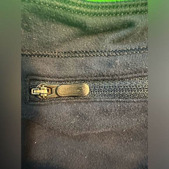 Lululemon Capri athletic pants. Navy blue with green trim. Size 10 without tags. - Picture 2 of 6